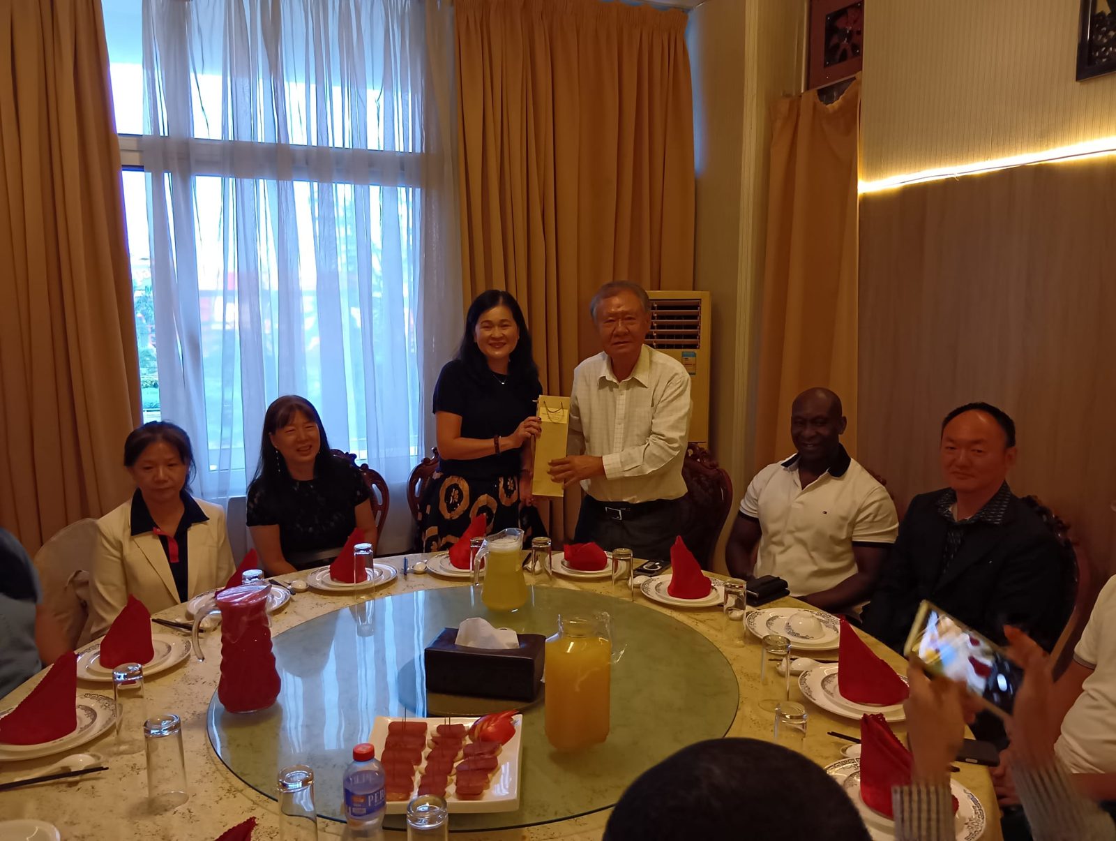 Gift presentation at a dinner